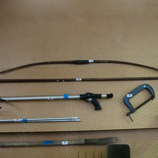 brass hook on wooden pole