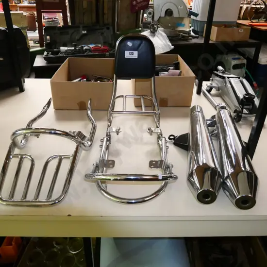 accessories for a Triump Bonneville motor cycle; exhaust, seat frames