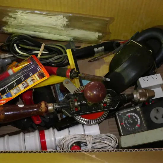 box; egg beater drill, soldering irons, ear muffs etc