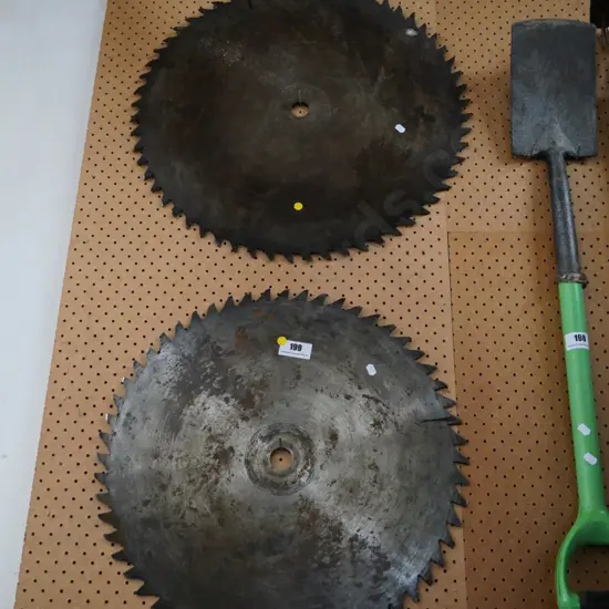 2 large circular saw blades - yellow dots