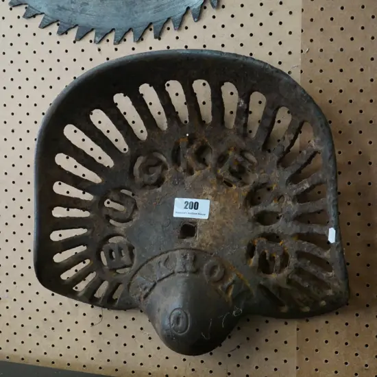 vintage Buckeye cast iron tractor seat