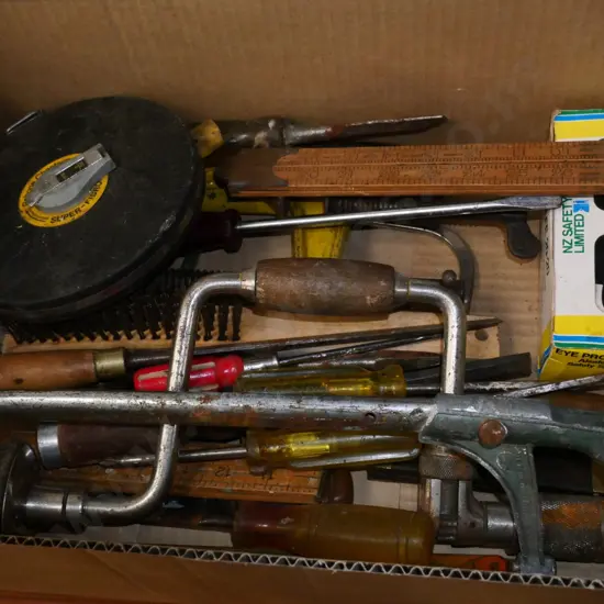 box; hack saws, clamps, tape measure, wire brush etc