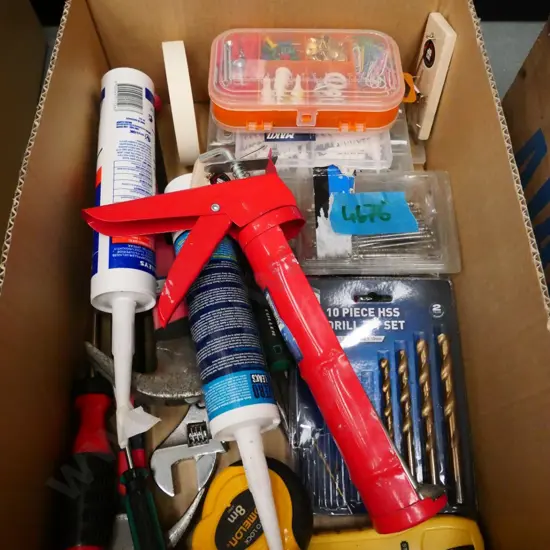 box; caulking gun, drill bits, mouse traps etc