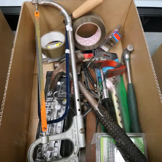 box; hack saw, hammers, magnet, open ended ring spanners etc