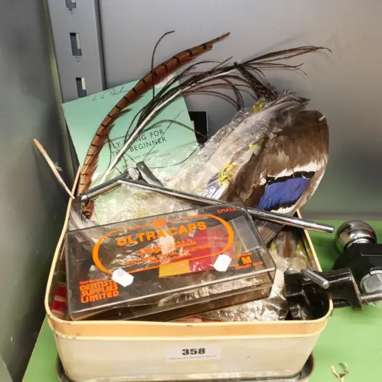 fly tieing accessories; clamps, feathers etc