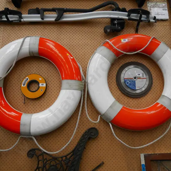 pair of life preservers - yellow dots