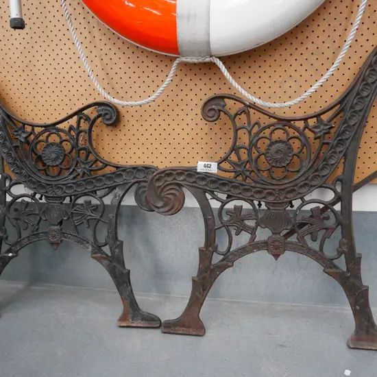 pair of Victorian cast iron garden bench ends