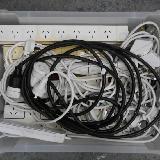 plastic tub of extension cords, multi boxes