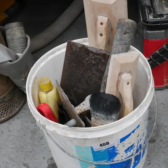 box of plaster's floats, trowels, hammer etc