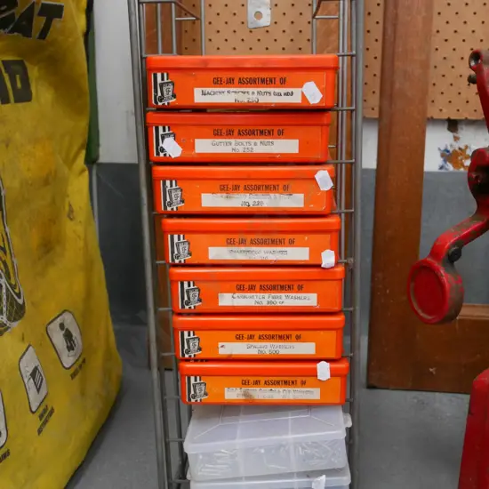 wire crate with plastic trays of assorted screws, nuts, bolts, washers etc