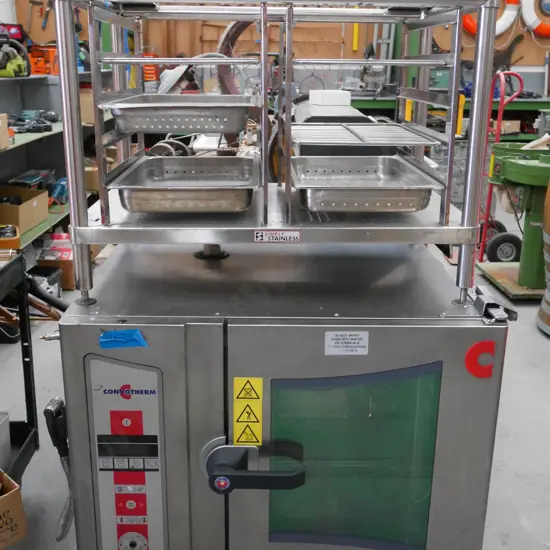 Convotherm OES 6.10 mini oven with stainless steel stand and 3 baskets and 3 trays (stand on top of oven)