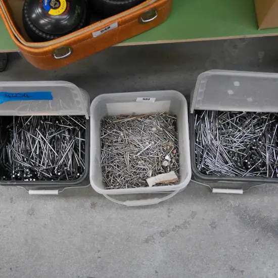 3 plastic tubs of nails