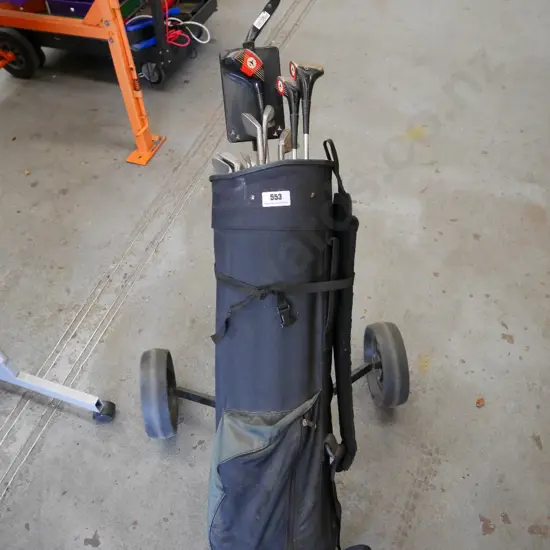 golf clubs and trundler