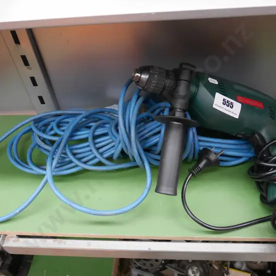 Metabo electric drill and blue extension cord