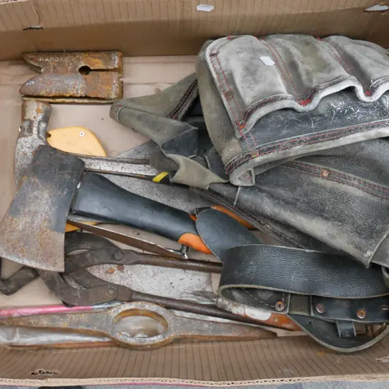 builder's belt, hatchet, trowels etc