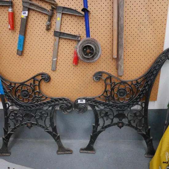 pair of cast iron garden bench seats