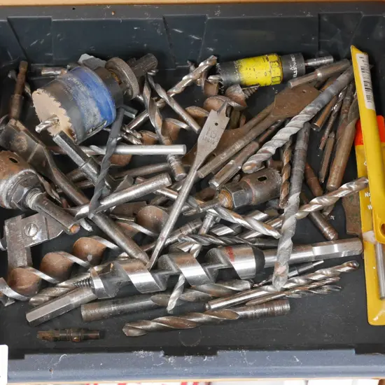 plastic tray, hole saws, drill bits etc