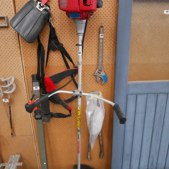 Honda commercial scrub cutter with harness and blades