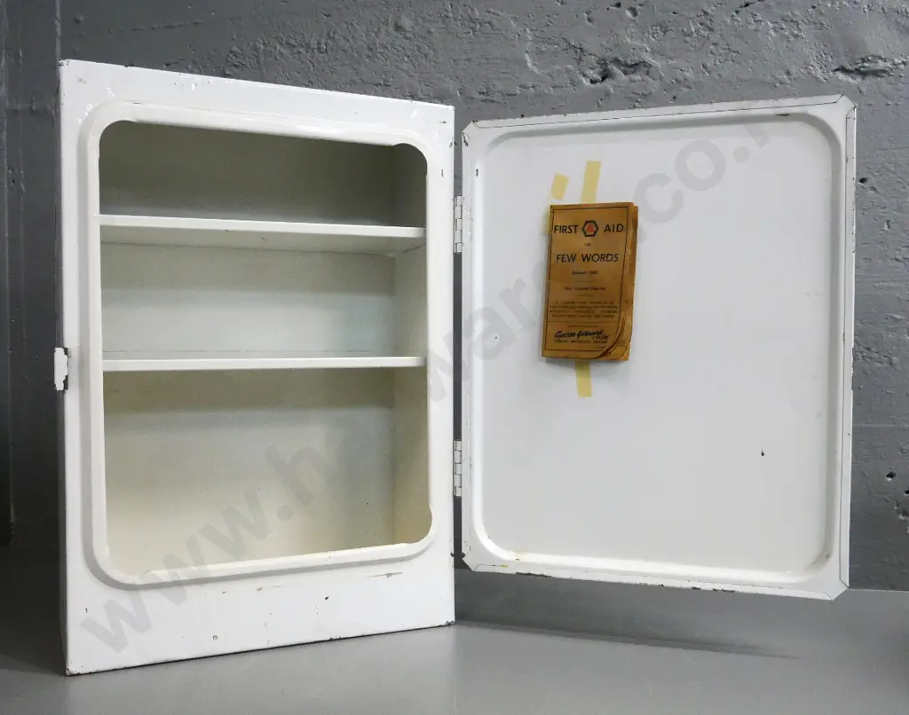 vintage metal wall cabinet - painted, w/ "St. John's Ambulance First Aid Cabinet" on door. Some corrosion H480 W330 D160 Image 1++