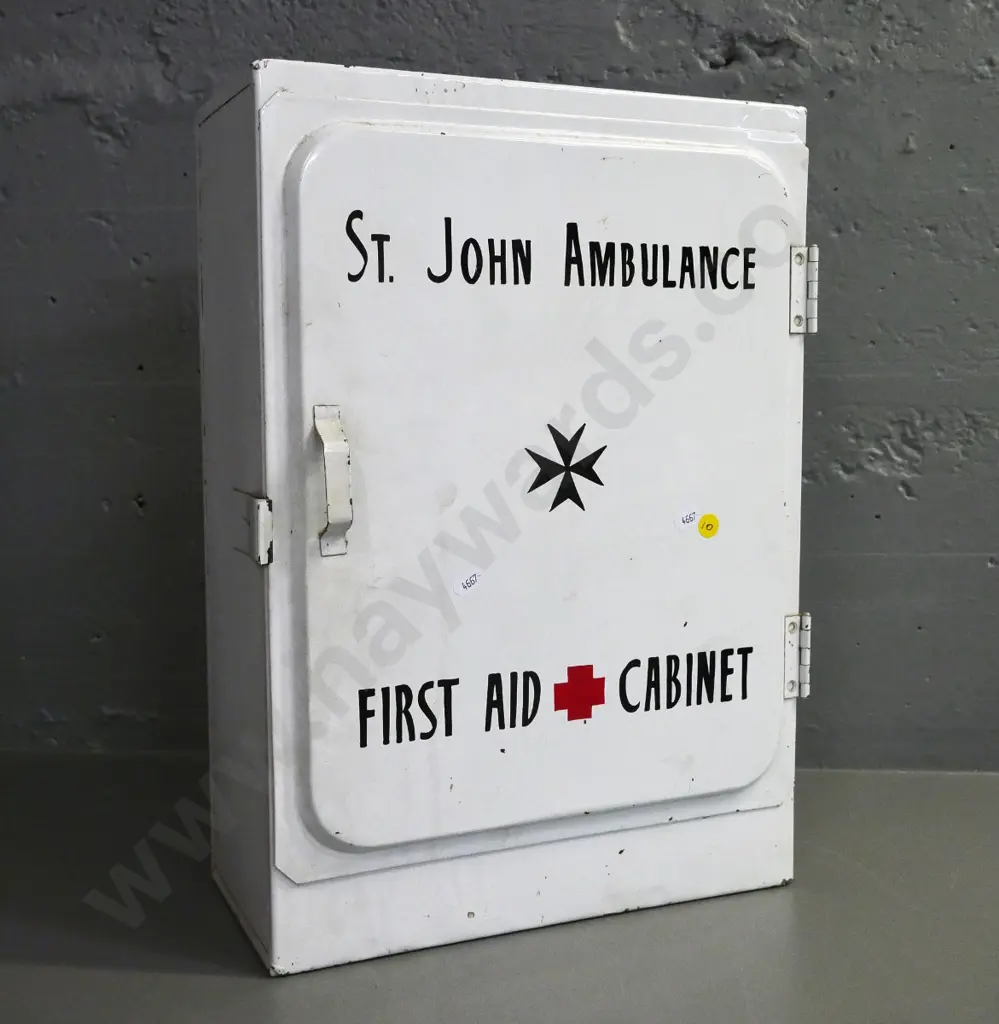 vintage metal wall cabinet - painted, w/ "St. John's Ambulance First Aid Cabinet" on door. Some corrosion H480 W330 D160 Image 1++
