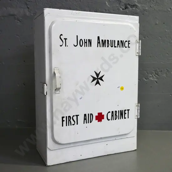 vintage metal wall cabinet - painted, w/ "St. John's Ambulance First Aid Cabinet" on door. Some corrosion H480 W330 D160