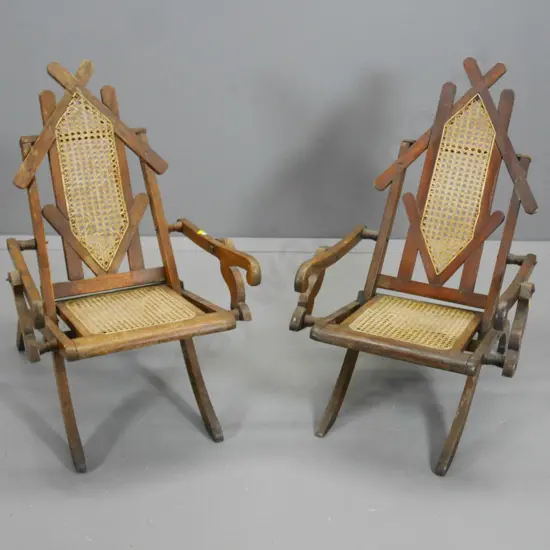 pair of vintage walnut folding chairs with bergere cane seat and back - looseness to joints, minor damage to cane H790