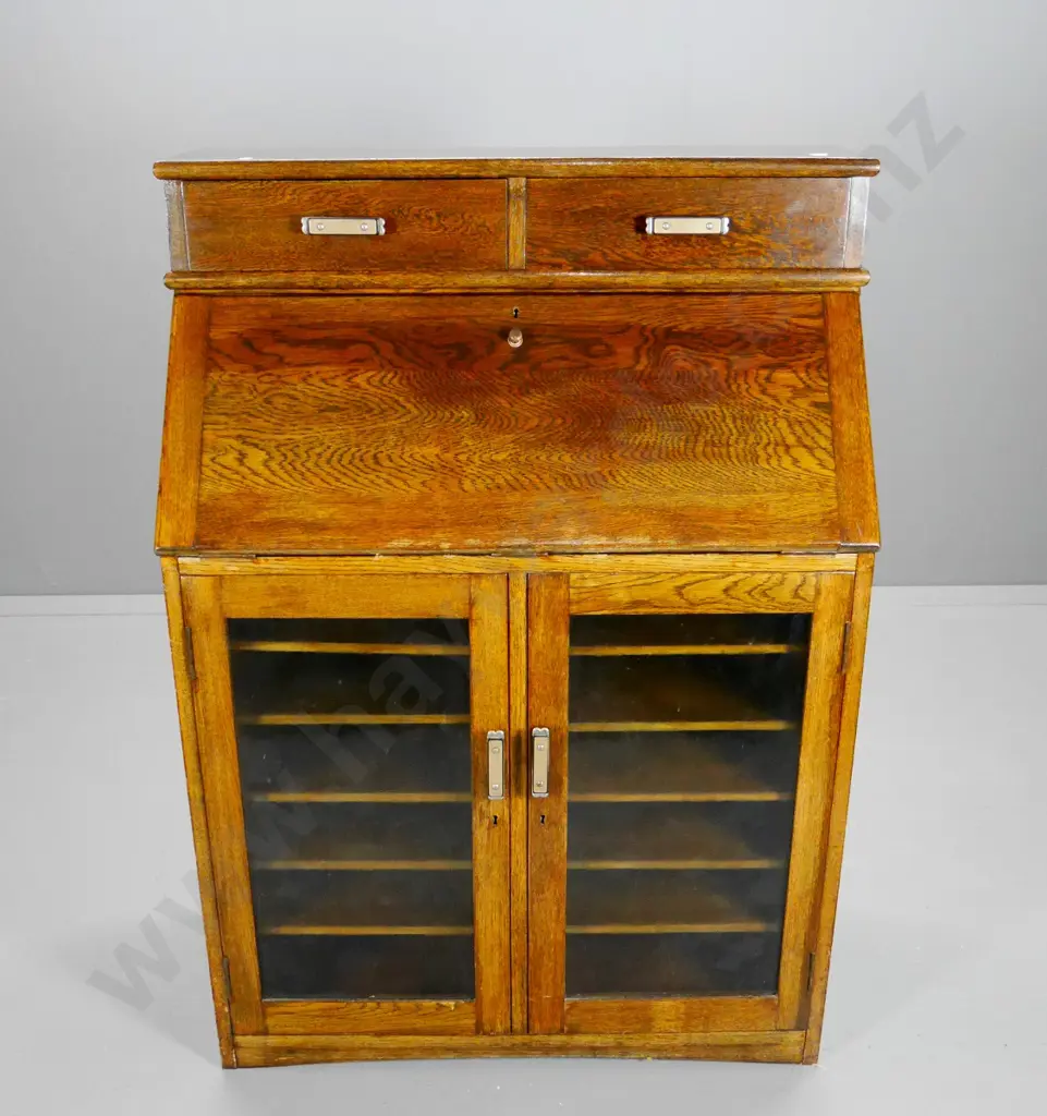 deco oak drop-front writing desk w/2 upper drawers, glazed cupboard, interior shelves & dividers H1170 W840 D440 Image 1++