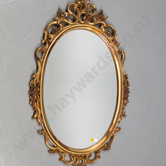 gilt framed oval wall mirror H-720 W-440
