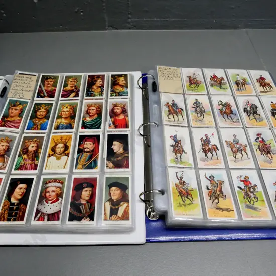 2 binders full of cigarette collector's cards in album sheets - historical & royal, military, etc.