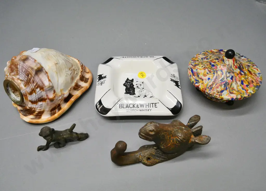 retro multi colour plastic trinket, Black & White whisky ashtray, carved shell w/brass fitting, cast brass coat hook etc Image 1++