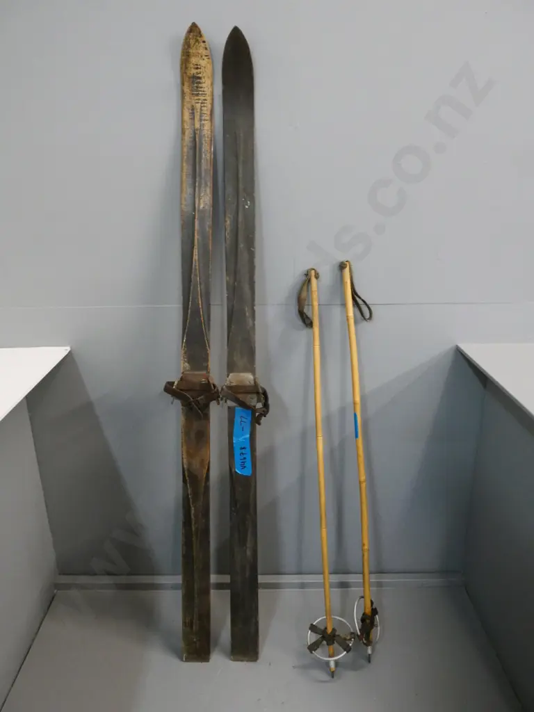 pair of vintage wooden skis L-1510 and poles with leather basket straps - corrosion to ski bindings Image 1++
