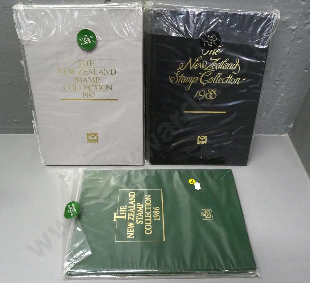 3 slip-cased hard bound New Zealand Stamp Collection issues 1986, 1987, 1988 Image 1++
