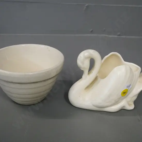 2 Crown Lynn items - early tiki mark beehive mixing bowl and a small white swan vase with glaze fleck