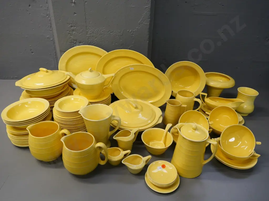large quantity of Crown Ducal yellow dinnerware including teapot, jugs, etc. Image 1++