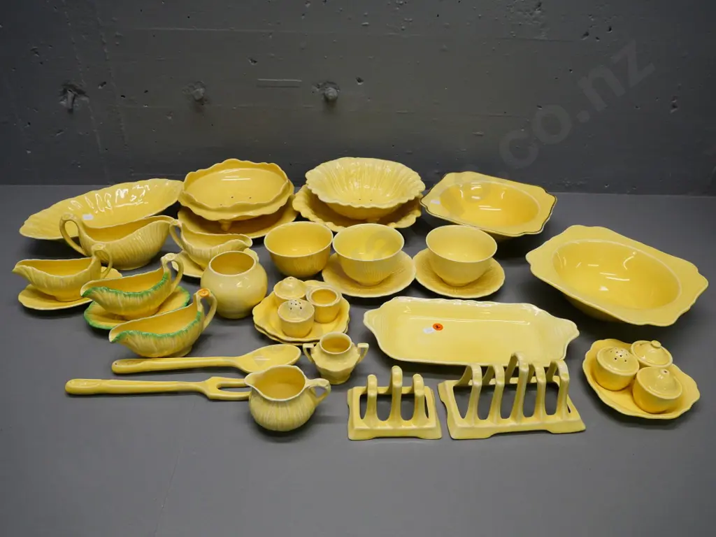 large quantity of Crown Ducal yellow table and serving ware - one server mended, some finish wear Image 1++