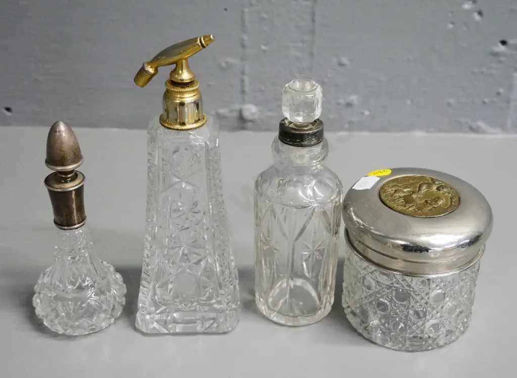 3 vintage crystal / depression glass scent bottles, one sterling silver mounted, one covered pot, atomiser part missing Image 1++
