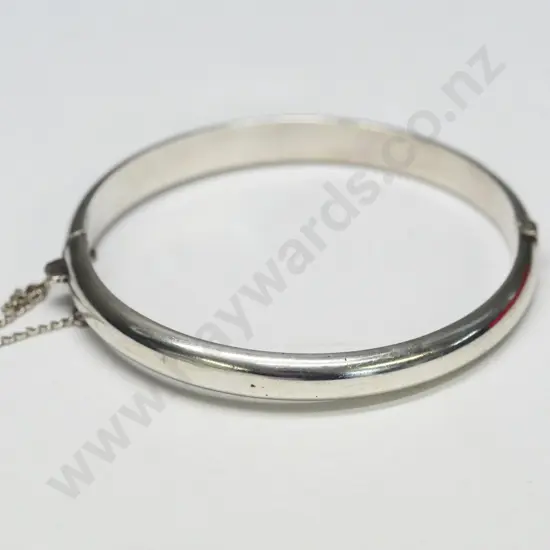 silver bangle withh safety chain stamped H&S stg sil made in NZ