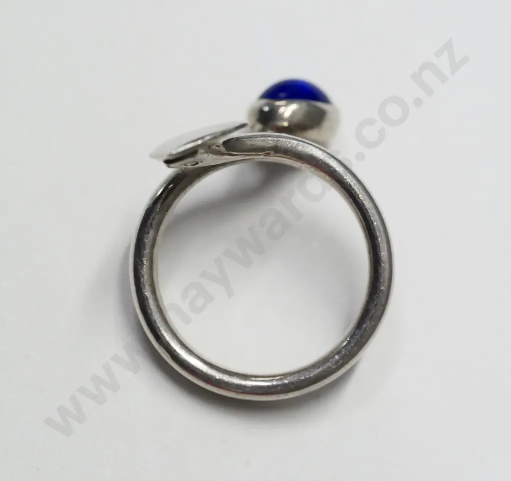 silver ring with a blue stone stamped 925 Mexico Image 1++
