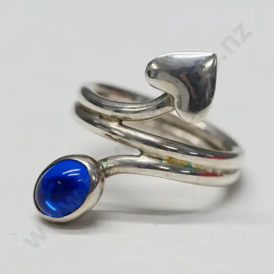 silver ring with a blue stone stamped 925 Mexico