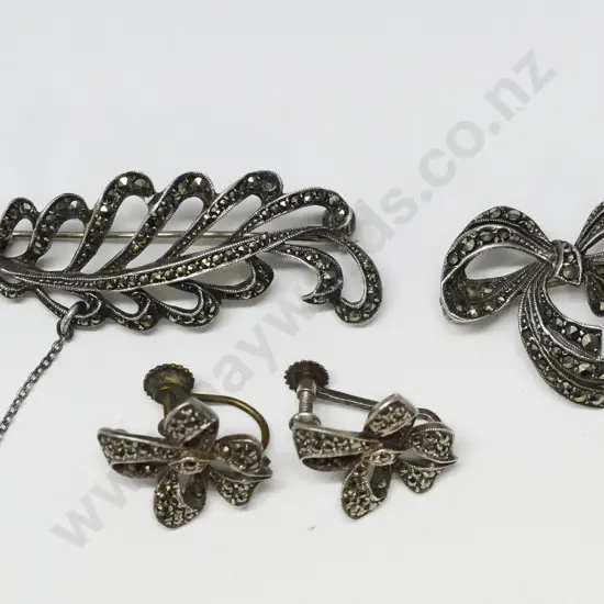 2 marcasite brooches stamped 925 & pair marcasite screw on earrings no mark