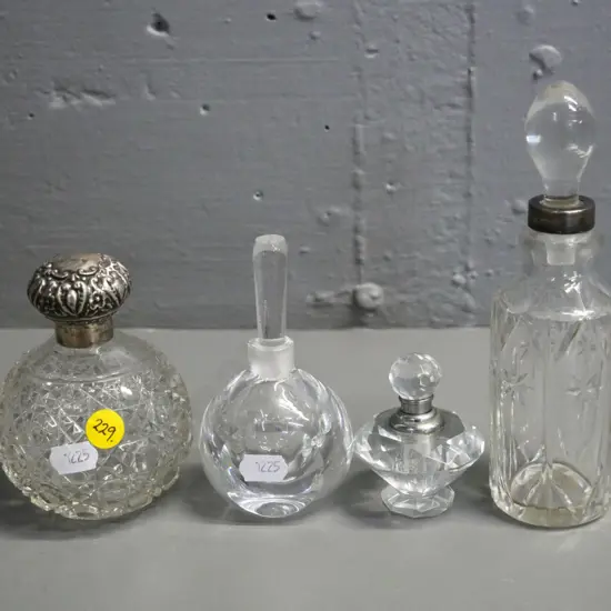 4 vintage crystal / depression glass scent bottles, one sterling silver mounted, slight damage to silver & one stopper