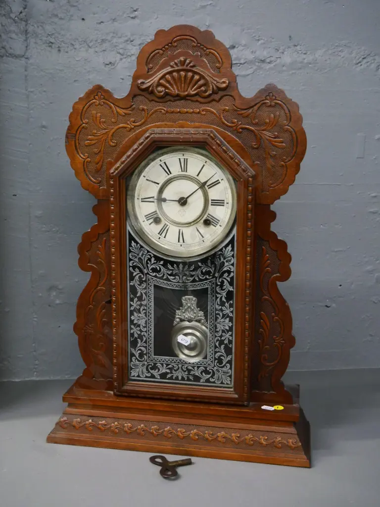 Ansonia mantel clock in carved wooden case, with key, some borer H-570 W-370 D-130 Image 1++