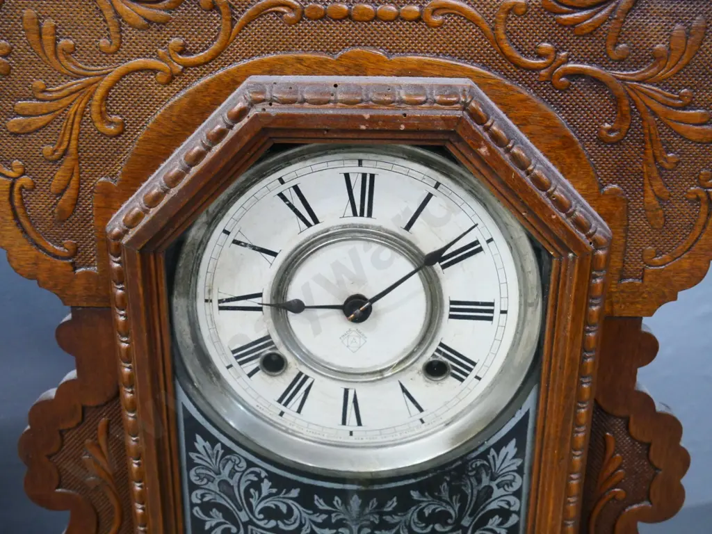 Ansonia mantel clock in carved wooden case, with key, some borer H-570 W-370 D-130 Image 1++