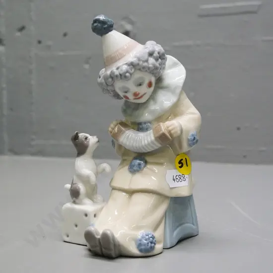 Lladro figure - clown playing an accordion, with a dog H-150 W-70