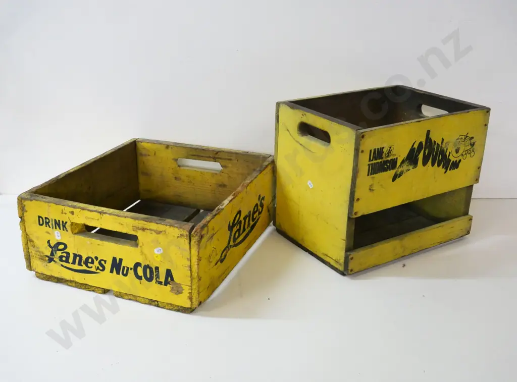 two yellow painted Lane's soda crates - Bubbly One and Nu Cola, wear to paint on both Image 1++
