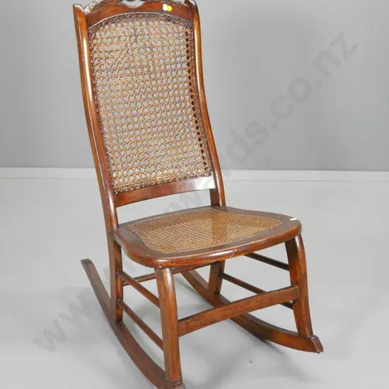 vintage rocking chair with carved back rail, bergere cane seat and back H-930 W-470 D-730