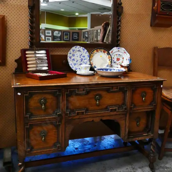 deco carved oak duchess w/ brass handles, bevelled mirror on Jacobean twist supports - wobbly H1620 W1130 D520