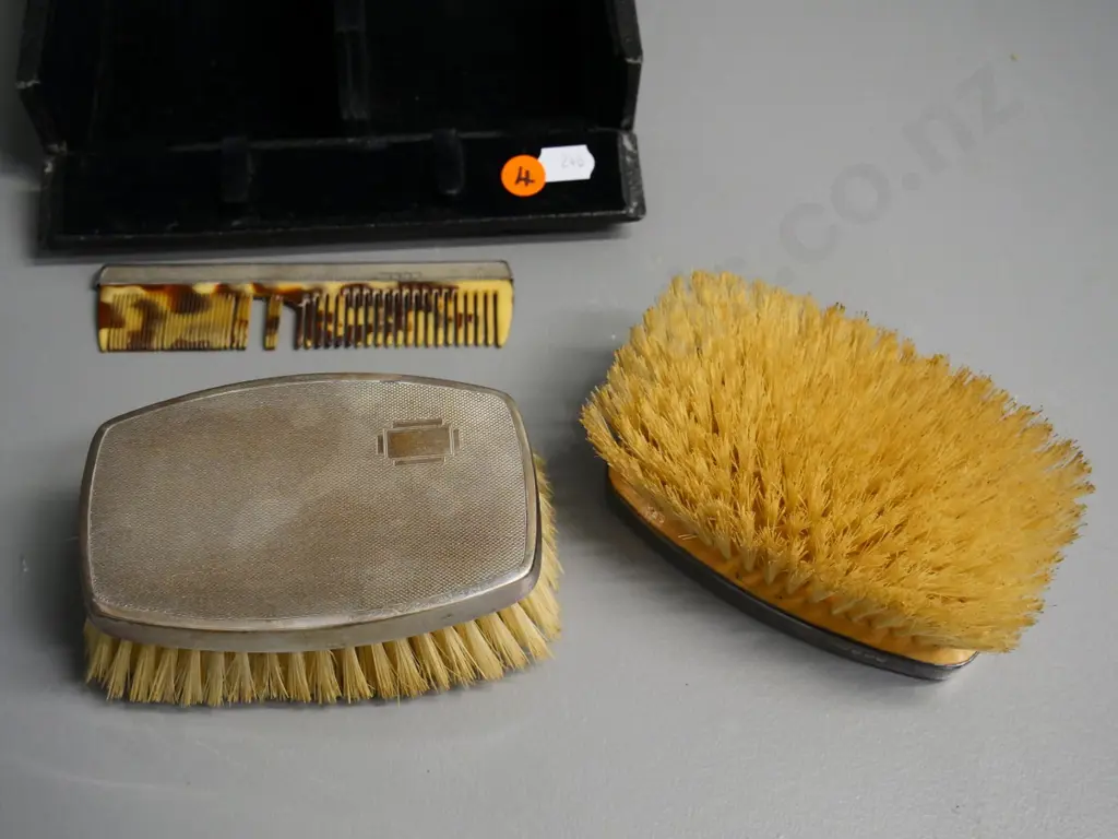 cased sterling silver backed brush and comb set - damage to teeth of comb Image 1++