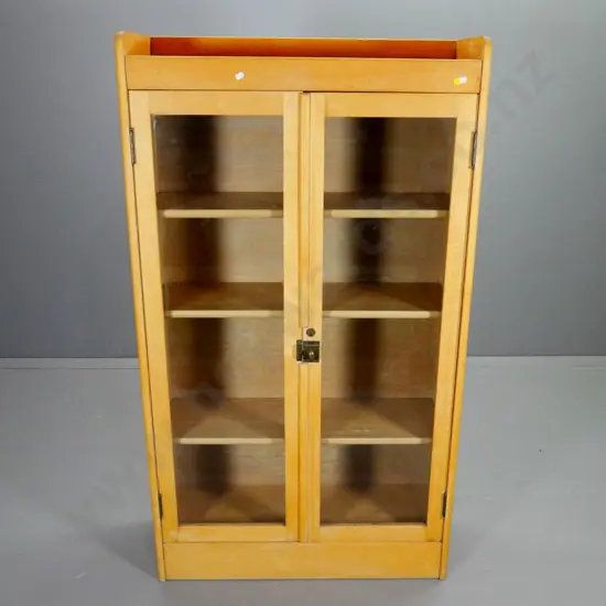 rimu bookcase with 2 glazed doors, 3 adjustable shelves, low gallery on top, brass hardware H1420 W800 D300