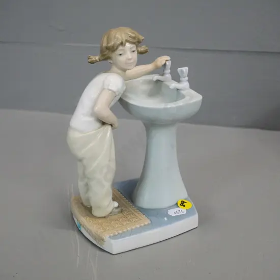 Lladro  figurine - girl at hand basin H-200